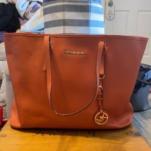 Large orange Michael Kors bag